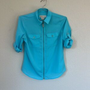 Blue zippered blouse. Casual yet trendy.